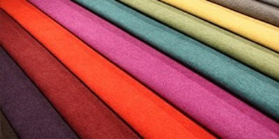 Colorful fabric rolls for corporate uniforms and textile materials